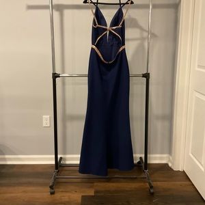 Royal blue formal dress with rose gold trim. Never worn